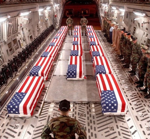 american-flag-over-coffins-in-plane